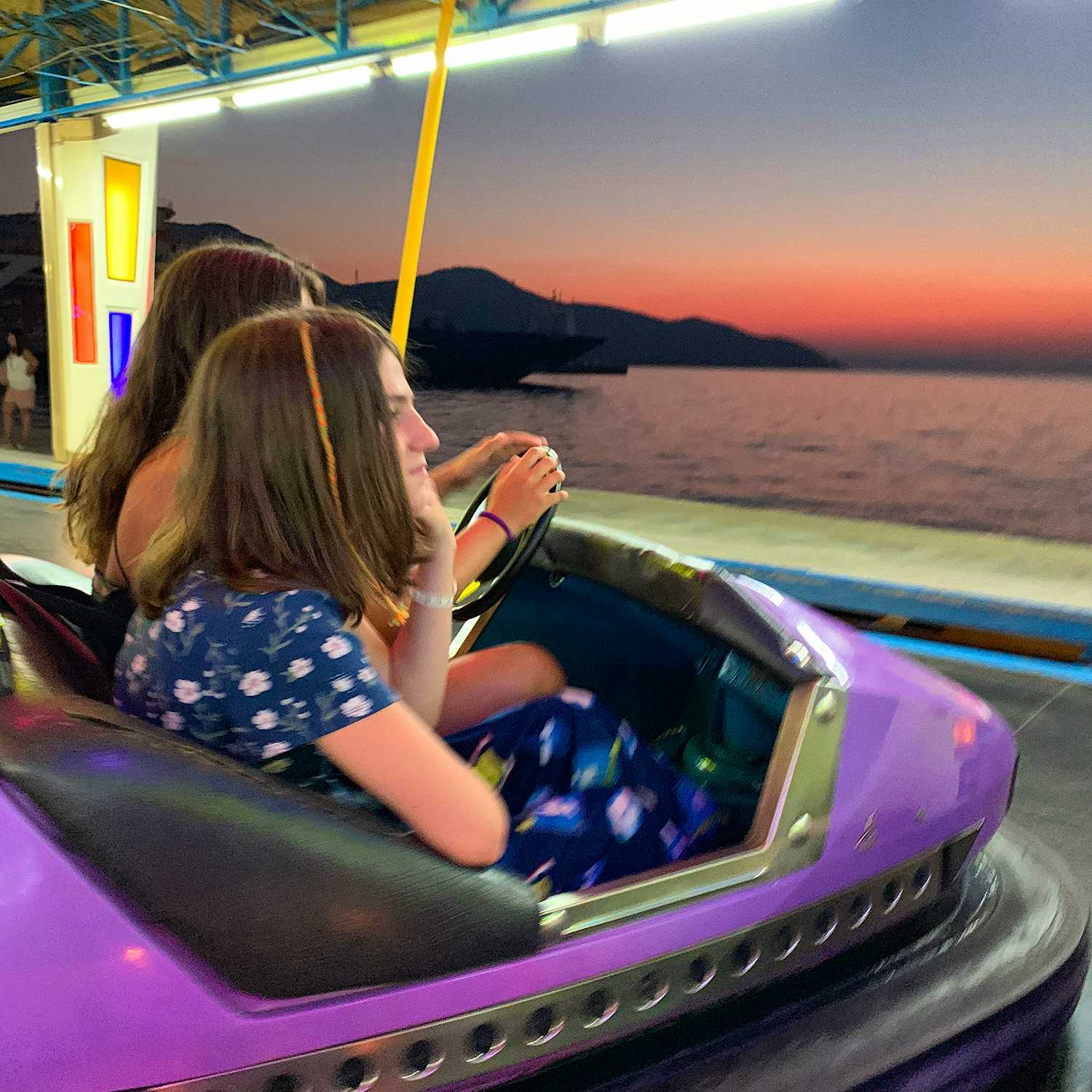 Photo Caption: Have fun after sunset with your kids at the Luna Park in Limenas