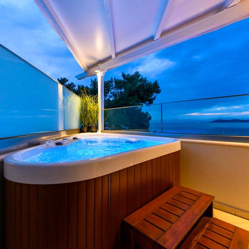 Photo Caption: Unwind in the jacuzzi with a stunning view
