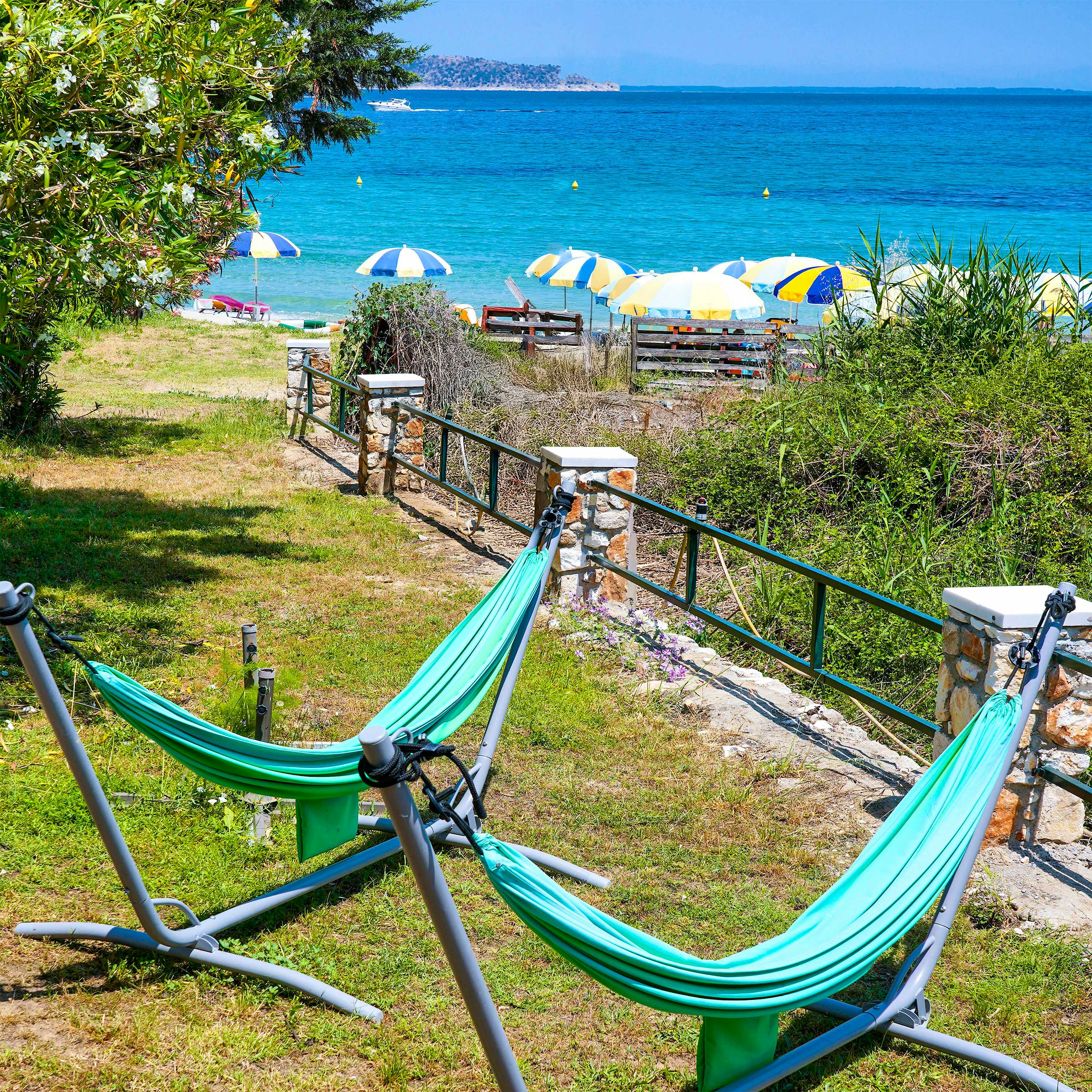 Photo Caption: Relax in the hammock with a sea breeze, read a book, or take a nap