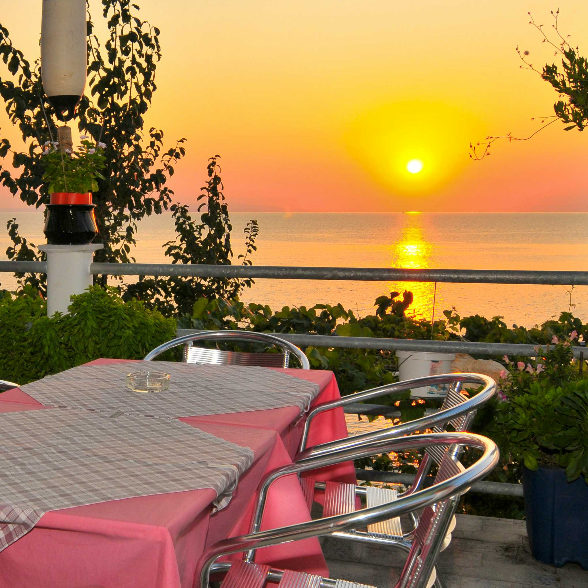 Photo Caption: Watch the sunset and relax at our café-bar