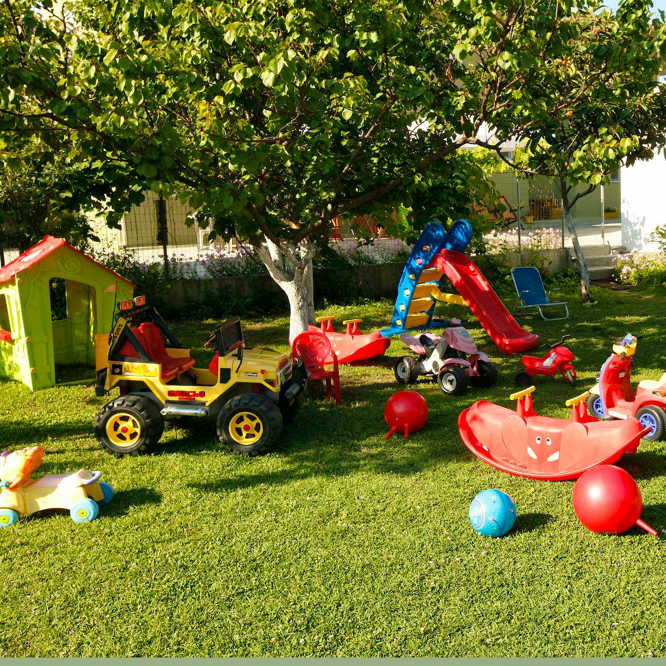 Photo Caption: Let the children roam freely in our big garden with a playground