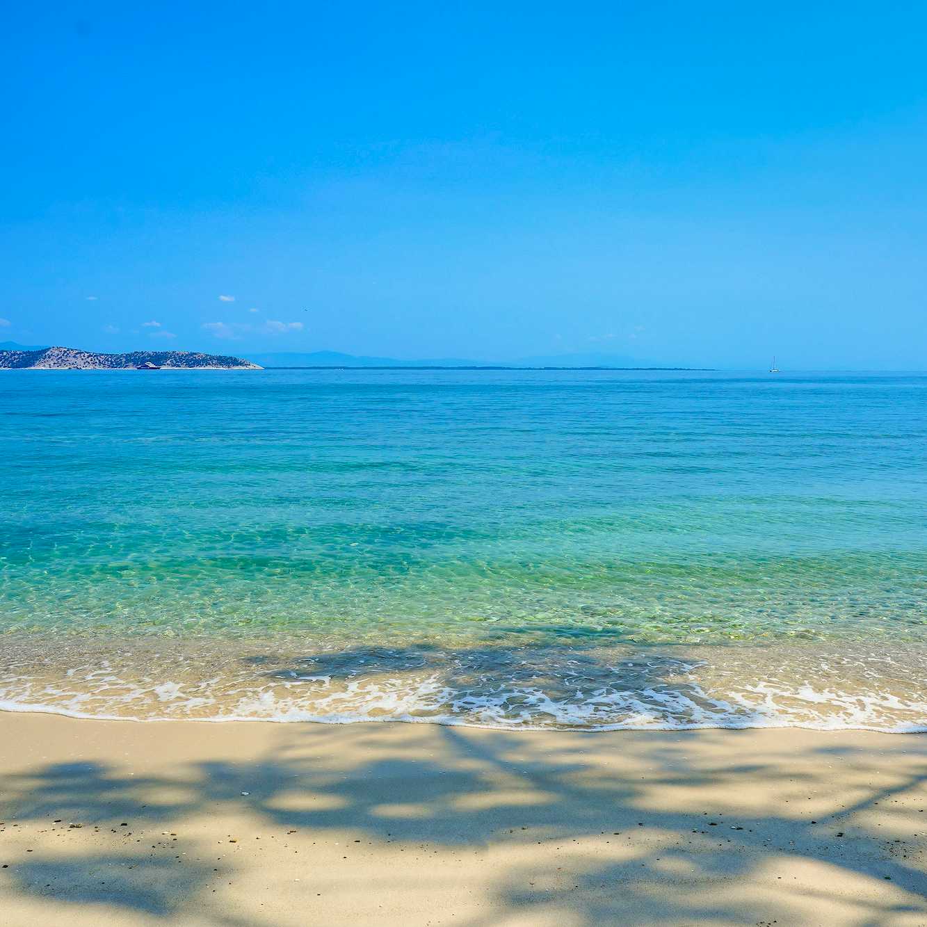 Photo Caption: Go for a swim nearby at sandy beaches like this one